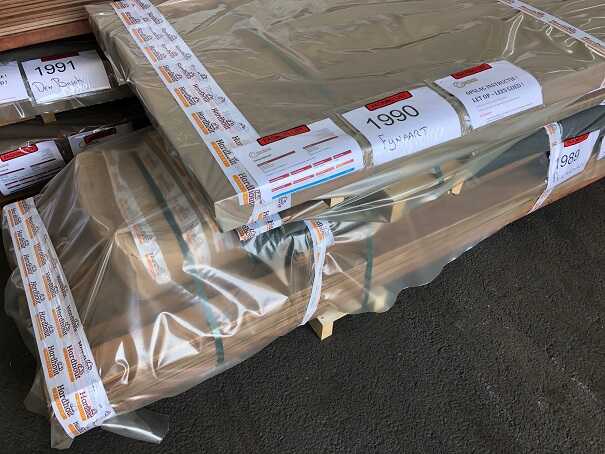 Bundle of hardwood timber packed carefully for reliable outdoor transport