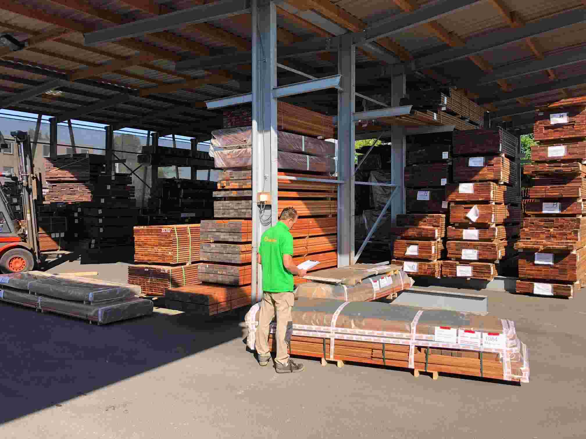 Careful quality check of hardwood timber packages before final delivery