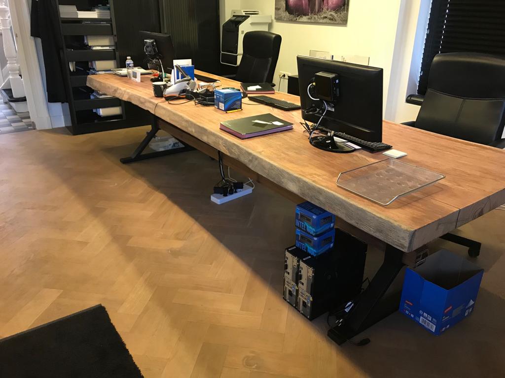 Solid Angelim Pedra tree trunk dining table showing the natural wood grain and live edge finish