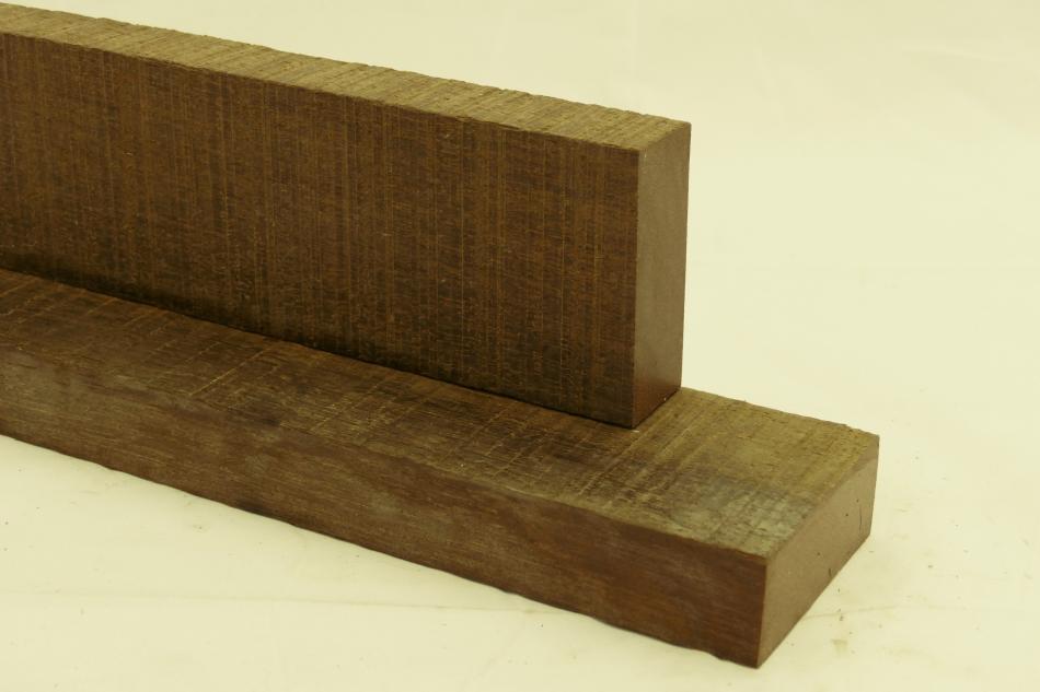 Fine sawn Azobe hardwood construction timber Two durable fine sawn Azobe hardwood construction beams for heavy outdoor building projects
