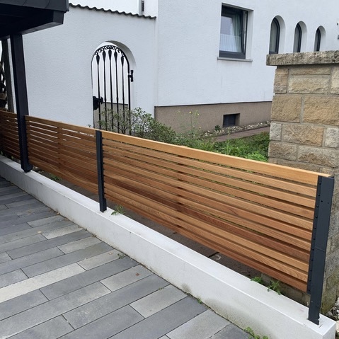 Bar fence made of ipe hardwood a modern look