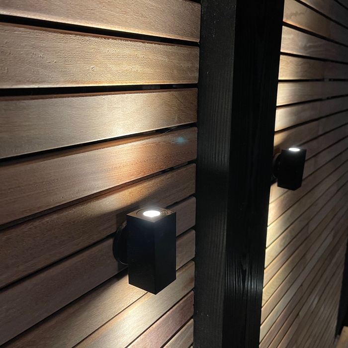 Luxury LED garden lighting on modern hardwood fencing