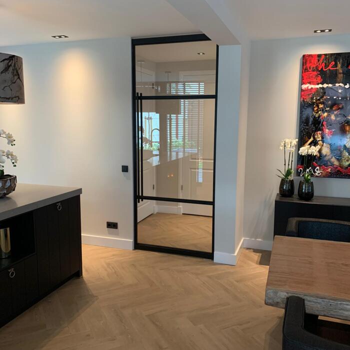 Modern black steel exterior single door measuring 220 by 100 centimetres