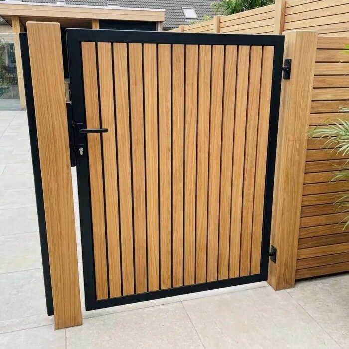 A gate to the pool or patio: Teak bespoke gate between patio and pool, 90 mm slats