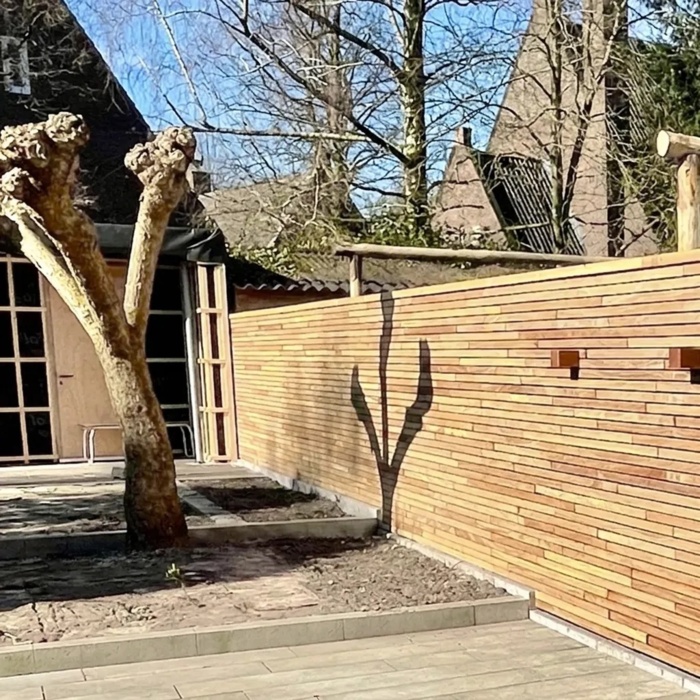 Teak slatted fence with 50 mm slats and no visible screws