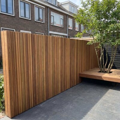 Ipe barcode fence, vertical, in a town garden