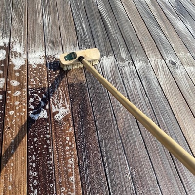 Ipe hardwood Scrubbing the wood with de-greaser
