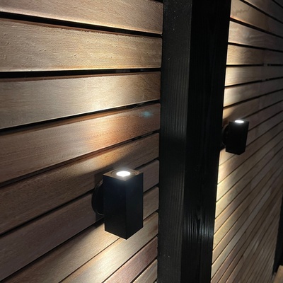 Luxury LED garden lighting on modern hardwood fencing