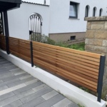 Bar fence made of ipe hardwood a modern look