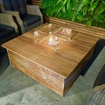 Fire pit table with flame