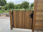 Ipe bespoke low gate inside the garden, 90 mm slats
