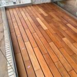 Decking board of ipe hardwood with assembly clips