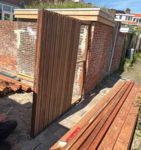 Luxury Ipe vertical slat fence installed at a contemporary architectural home