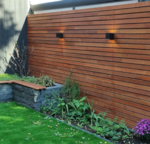 Oil to a slatted fence made of ipe wood