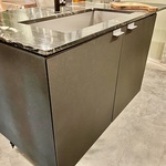 Outdoor kitchen of black steel with luxury hardstone counter top