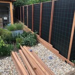 Simple fence system made from 70 mm ipe strips as a practical complete set.