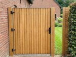Teak bespoke wide gate clad on both sides with 90 mm slats