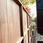 Tripple planks Back ipe wood vertically mounted modern fence 
