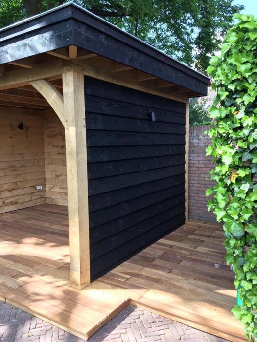 Canopy Oak with black walls and fascia, finished on the floor with ipe floorboards