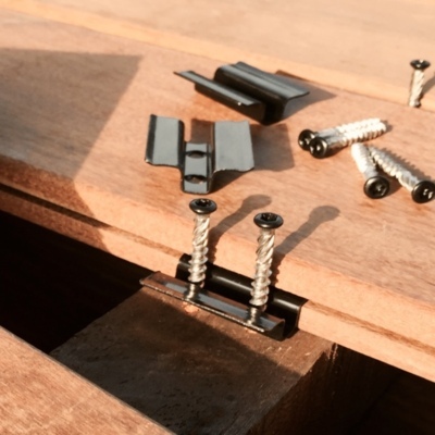 Ipe decking with clips for a screw-free finish and spacers ensuring uniform gaps throughout