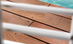 Hardwood decking boards with visible screws